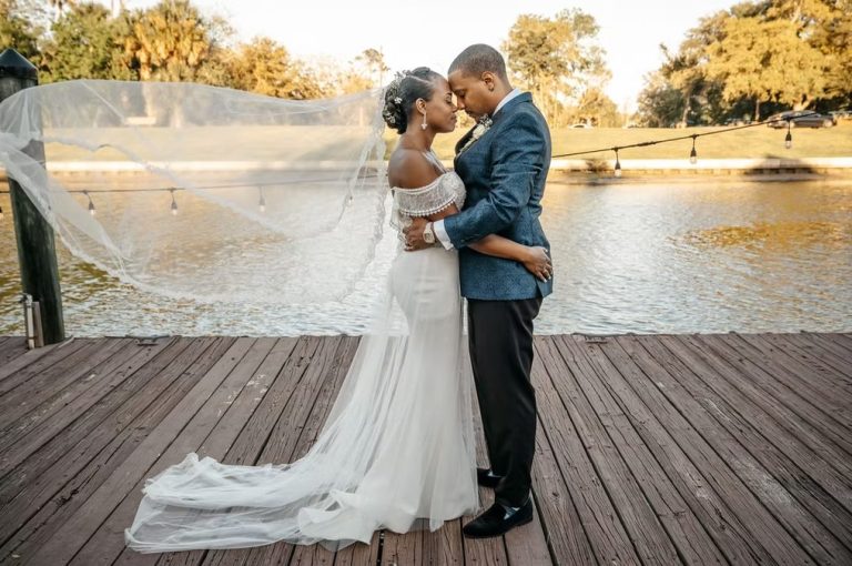 couple by he water 768x510